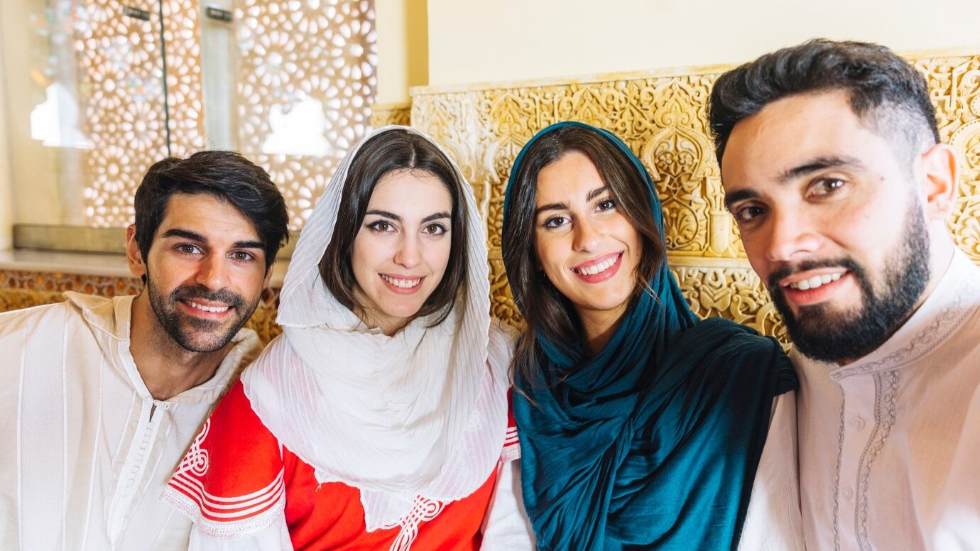 group-friends-taking-selfie-arab-restaurant-languages