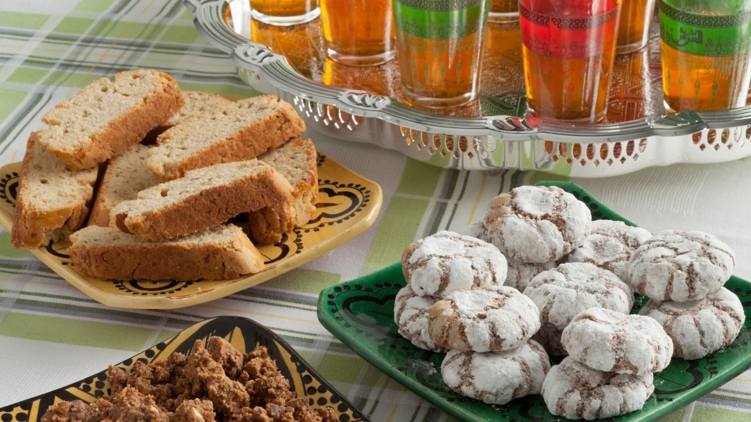 Ghriba almond cookies with characteristic cracks and mint tea Moroccan pastry traditional sweet honey