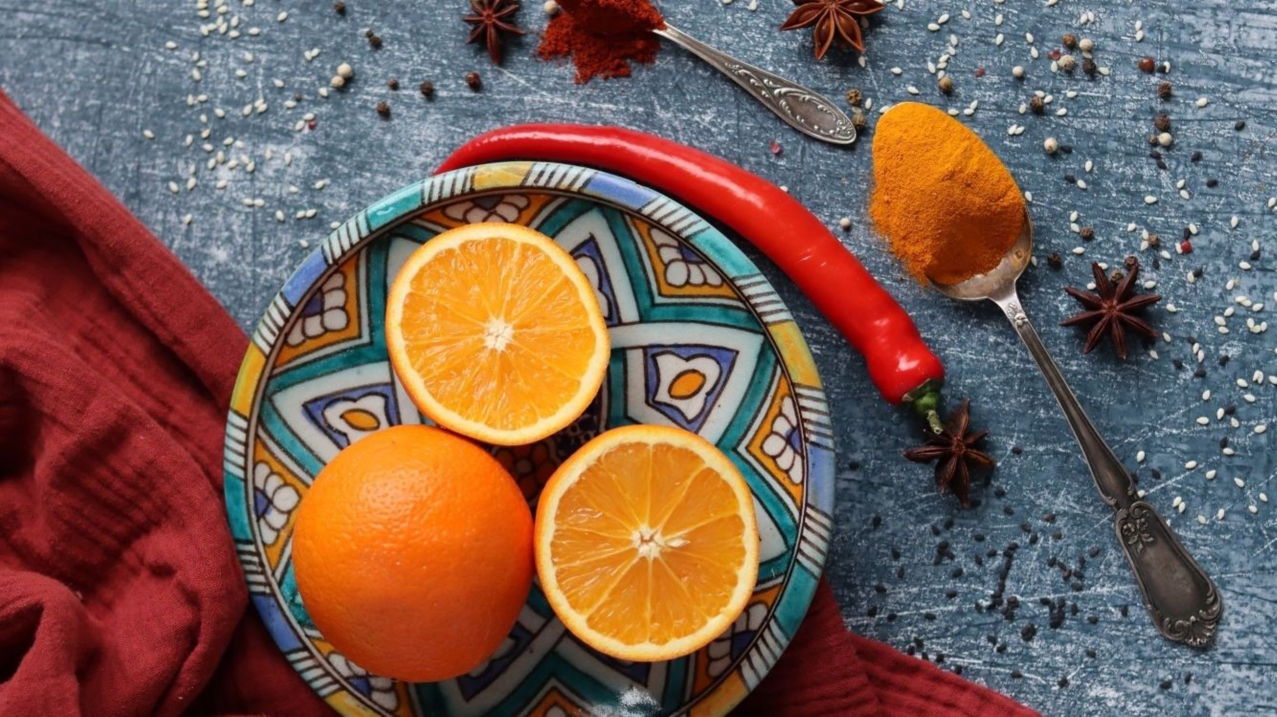 Traditional Moroccan spiced oranges arranged on decorative plate during citrus season, featuring fresh Navel oranges with cinnamon and orange blossom water for authentic dessert recipes