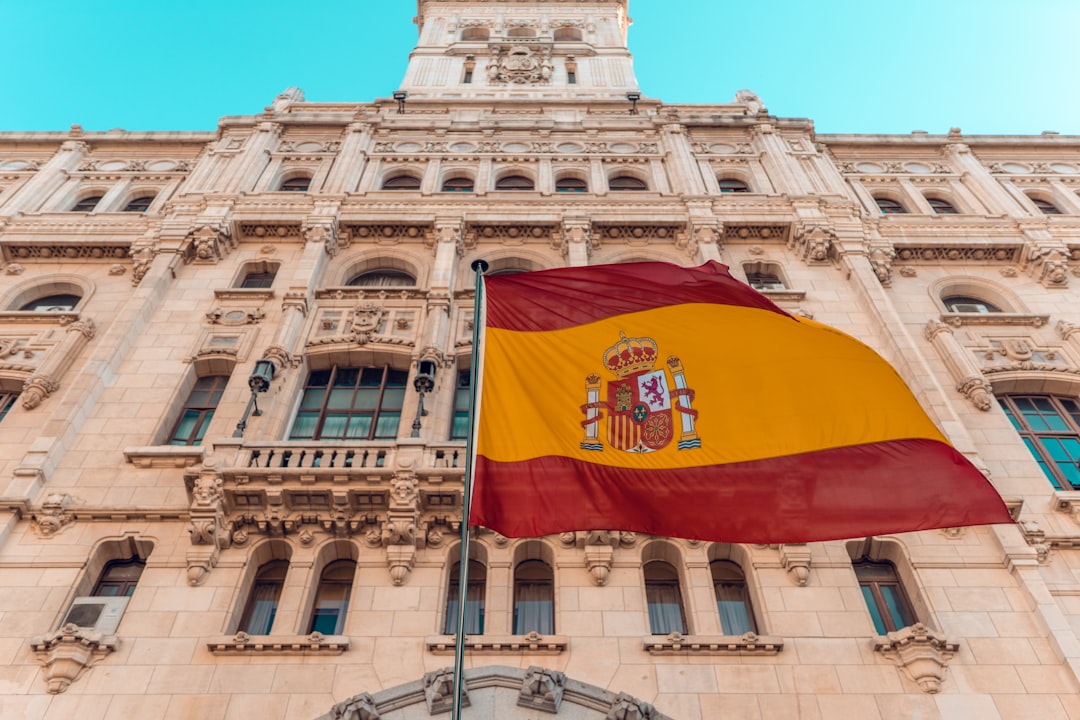 Moroccan nationals receiving Spanish citizenship documents at a naturalization ceremony in Spain