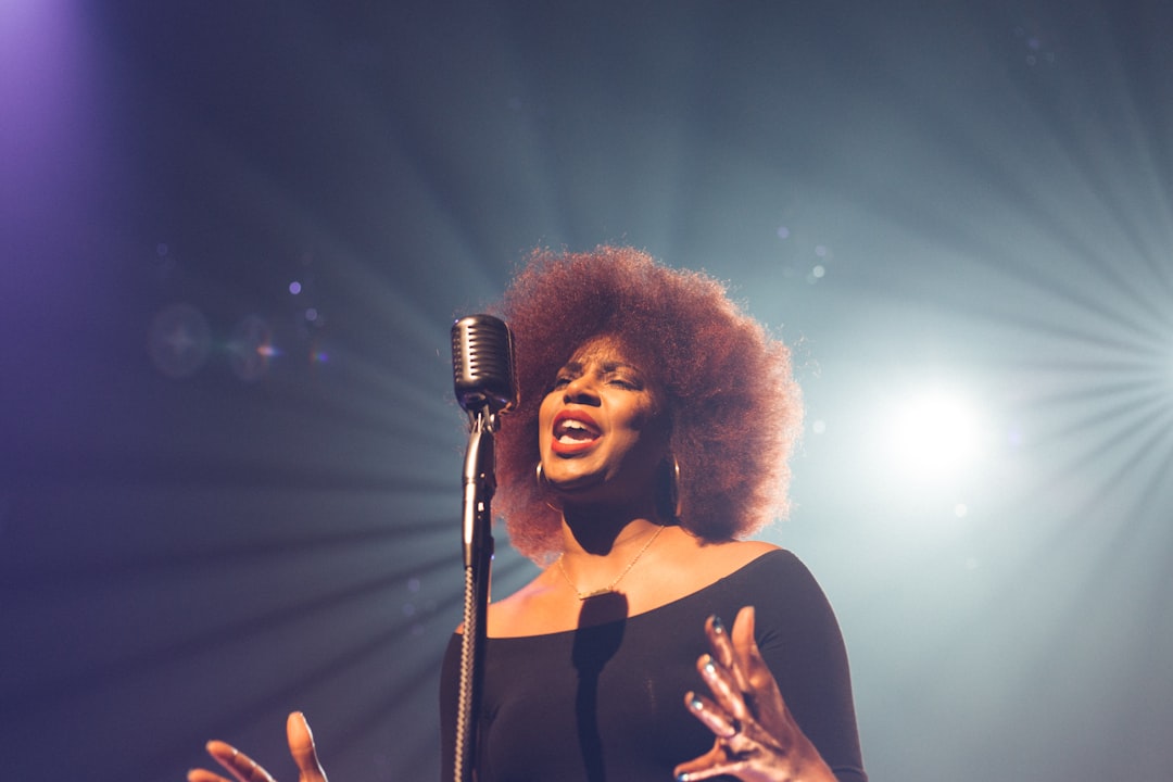 A female artist performs under stage lights at the Jazzablanca festival in Casablanca