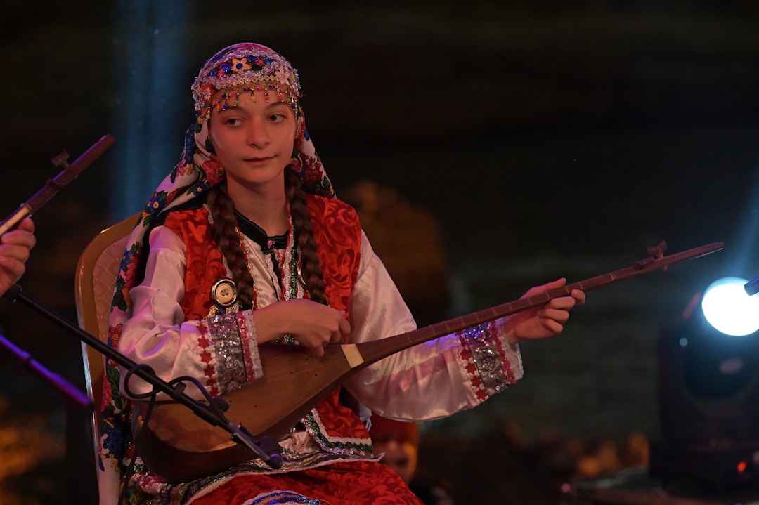 A female Amazigh musician performs on stage at the Timitar Festival in Agadir, Morocco
