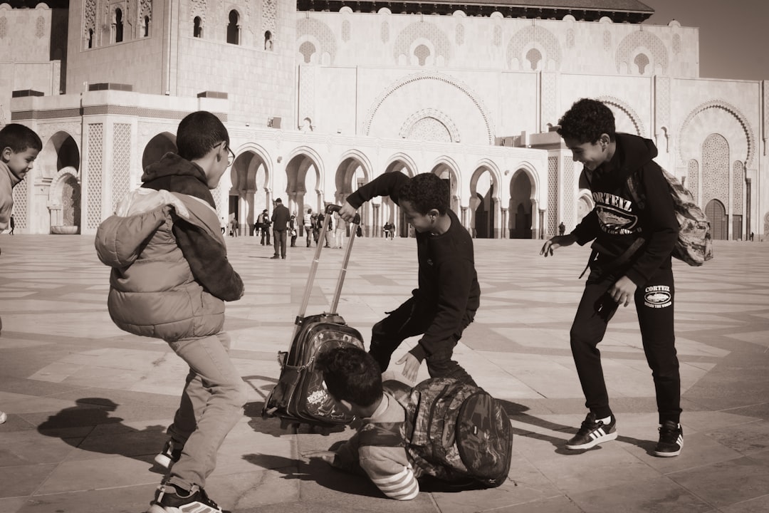 Young MRE children enjoying outdoor summer activities at a Moroccan heritage programme