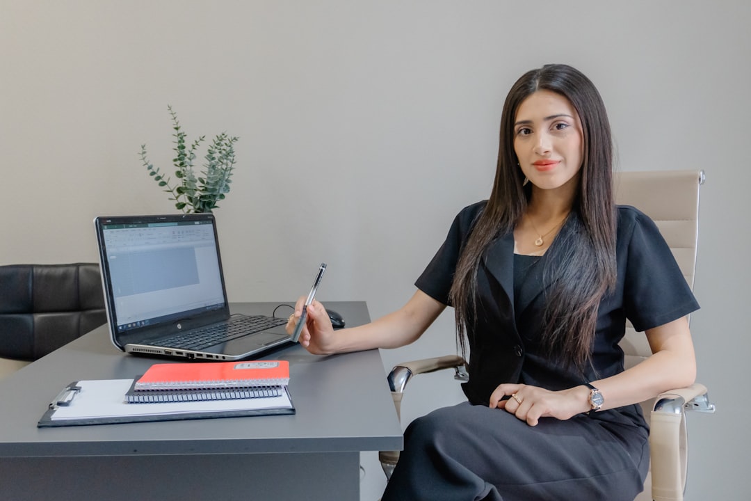 A professional reviewing an employment contract while hiring local talent in Morocco at a modern Casablanca office