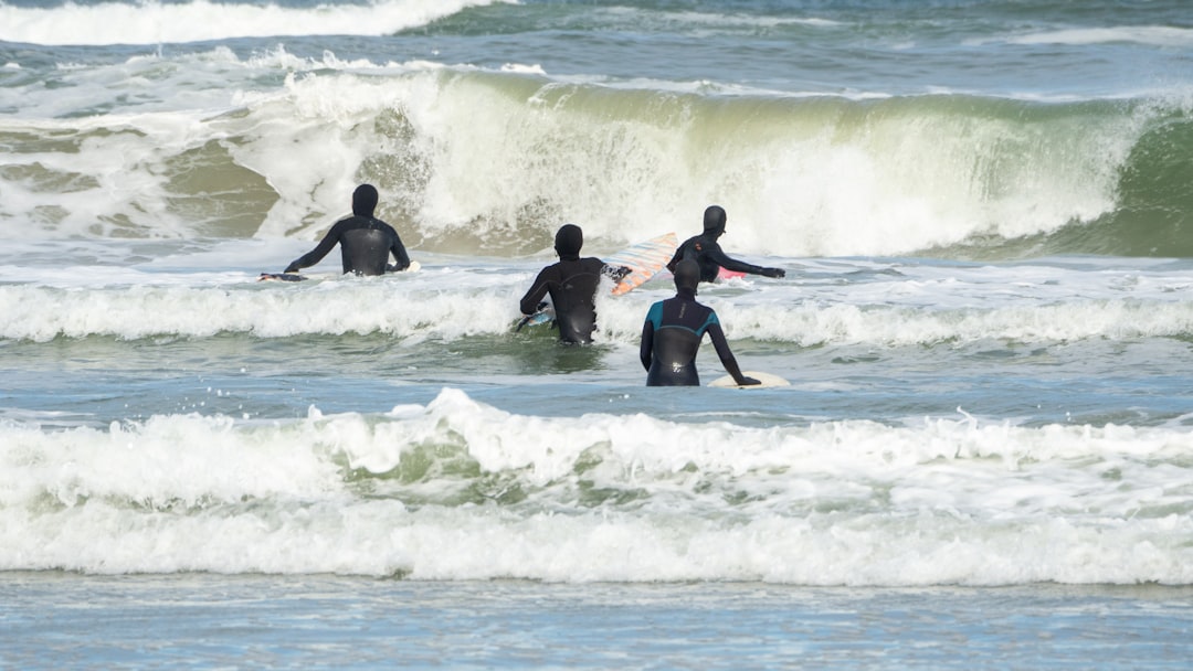 capturing the energy and wellness benefits of cold water swimming on Morocco's coast.