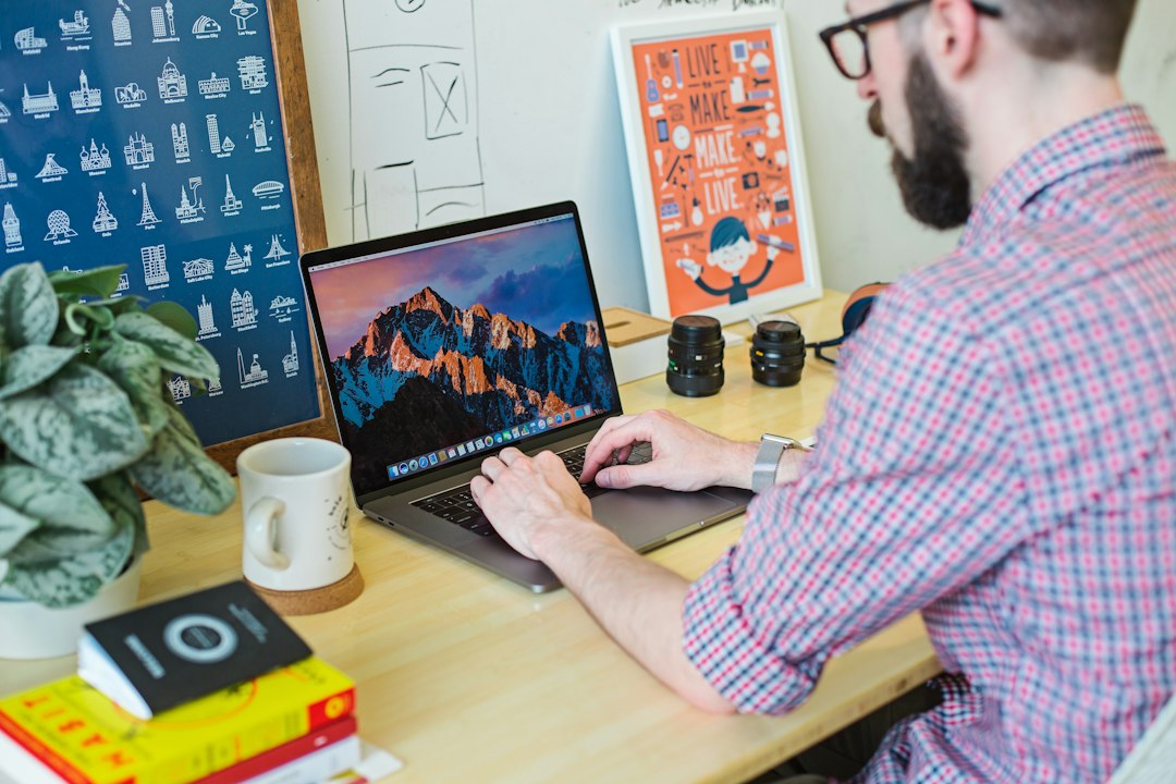 Man using breathing techniques at his desk in a Casablanca coworking space